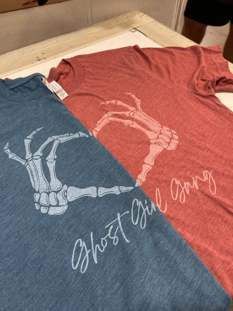 Two t-shirts screen printed with transparent white ink